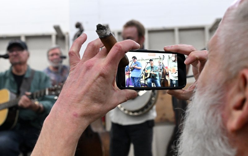 A oyster shucker records the band Danny Paisley and the Southern Grass.