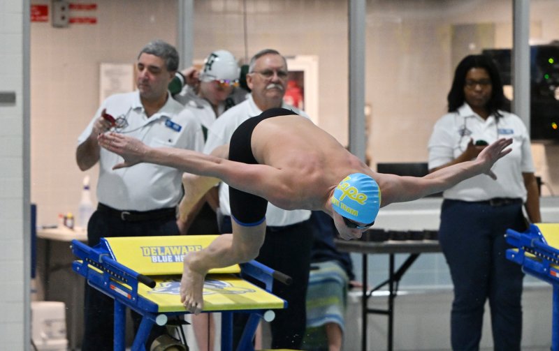 Cape’s Elijah Oliver leaves the blocks in the 100 free.