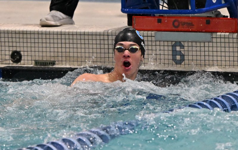 Cape’s Brady Schell finishes the 50 free.