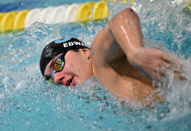 Cape’s Jaxen Edwards swims to a second-place finish in the 100 free.