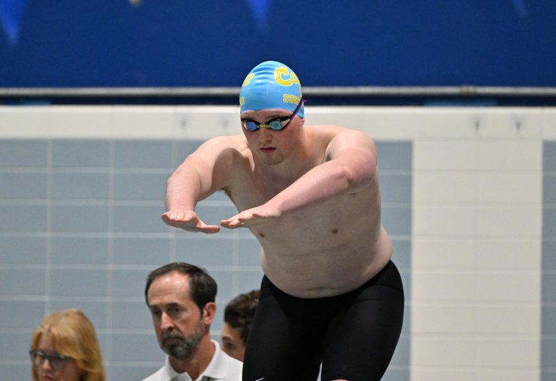 Cape’s Cole Huxtable waits his turn to start in the 400 free relay.
