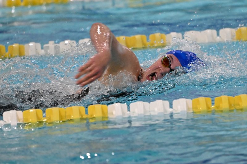 Caesar Rodney’s Payton Garnsey swims the free leg and wins the individual medley.