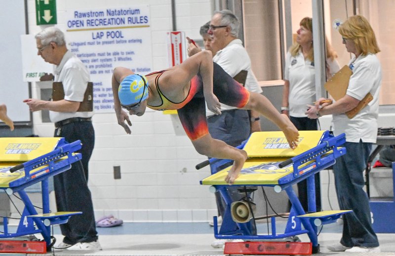 Cape junior Mia Jaoude leaves the blocks in the 50 frees. She won the event in 23.90.
