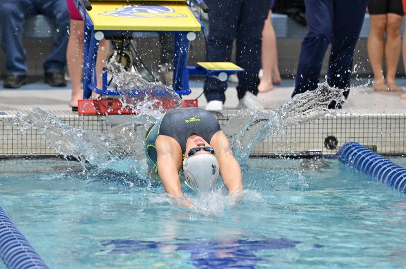 Sussex Academy’s Victoria Evans leaves the blocks in the 100 breaststroke. She finished in 1:02.45.