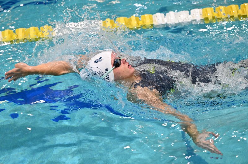 Sussex Academy’s Victoria Evans swims the 100 back.