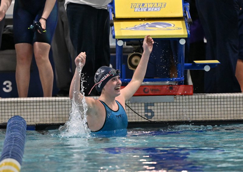 Sussex Academy sophomore Gretchen Maughan looks to her parents after placing second in the 100 breaststroke.