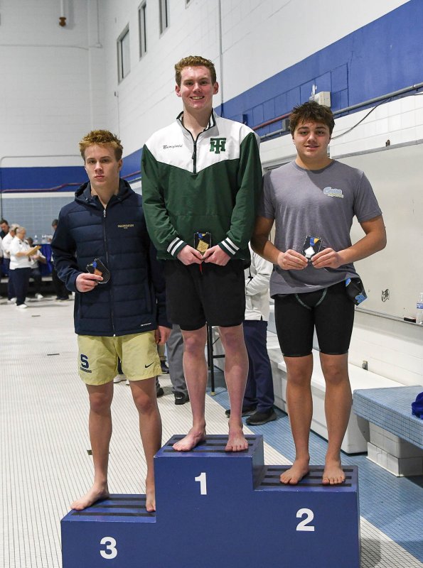 Jaxen Edwards gets the sliver medal in the 100 free. Tower Hill took gold, while Sallies took third.