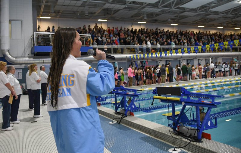 Cape senior Sidney Caldwell sings the national anthem to open the competition.
