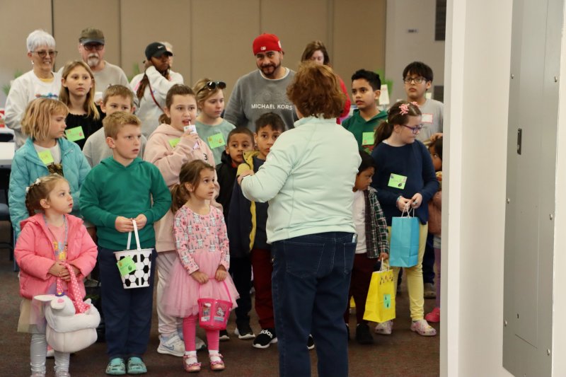 Eager egg hunters get final instructions before heading out on their search at the Lutheran Church of Our Savior in Rehoboth Beach March 28. The hunt was moved indoors because of the cold weather. BILL SHULL PHOTOS