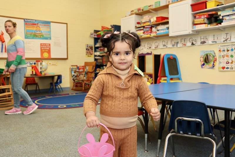 Kailani Rodriguez, 3, stopped for a second while searching for hidden Easter eggs.