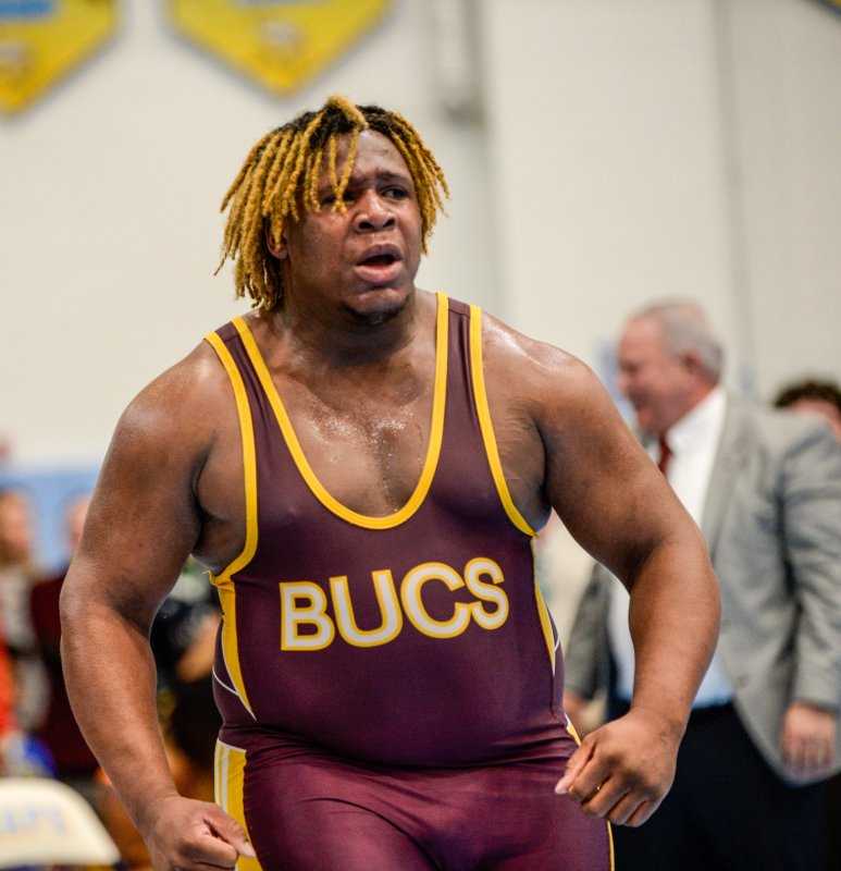 Greg Lockett of Milford wins the 285-pound title and finishes the season 46-0.
