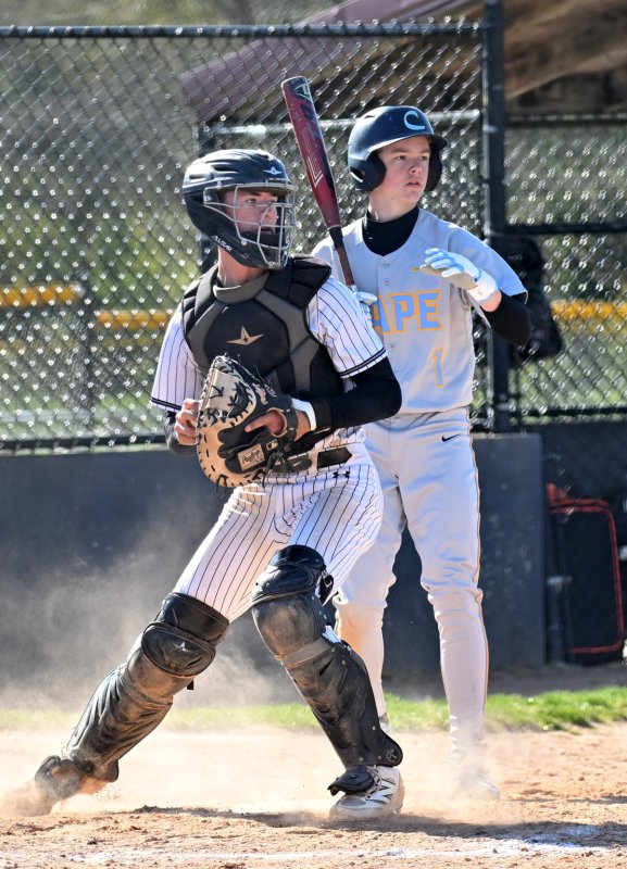 Tech catcher Braydon Hazzard prepares to throw out a base runner at second.