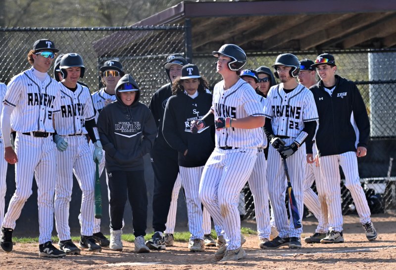Tech sophomore Lucas Joseph is met at the plate by his teammates after he went yard in the third.