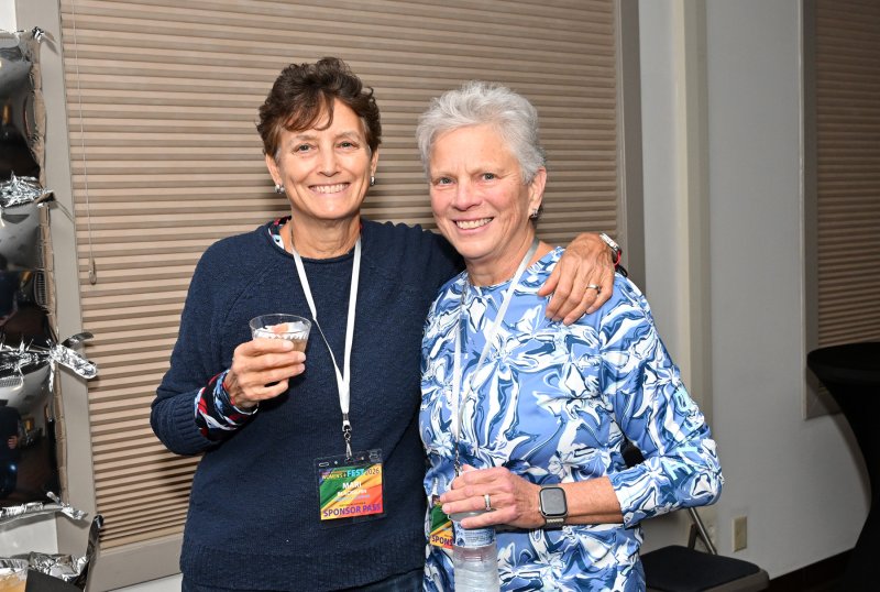 Having a libation at the meet-and-greet are Mari Blackburn, left, and Chris Lay.