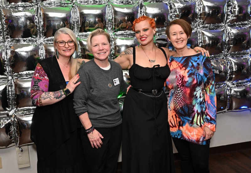 Enjoying the meet-and-greet are (l-r) Alli Brennan, CAMP Rehoboth Executive Director Robin Brennan, singer Yoli Mayor and comedian Mina Hartong.