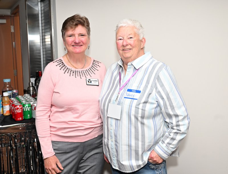 Leslie Ledogar, left, and Nancy Hewish enjoy the meet-and-greet.