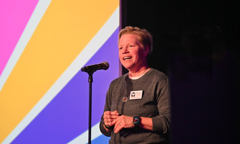 New CAMP Rehoboth Executive Director Dr. Robin Brennan speaks to the crowd at the event.