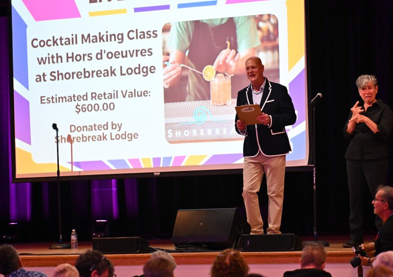 Lorne Crawford handles the auctioneer duties at the event.