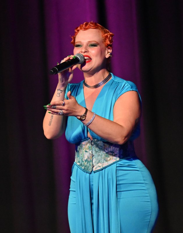 Yoli Mayor sings at Women’s Fest.