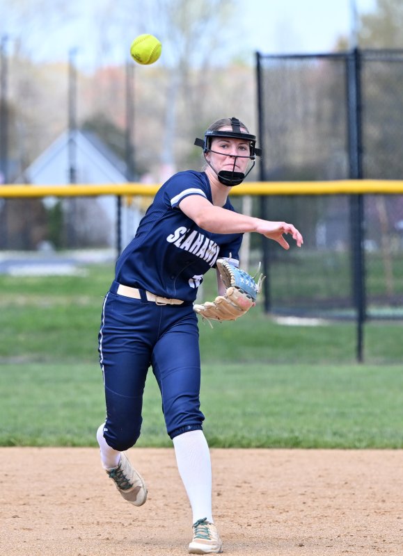 Sussex Academy freshman shortstop Danica Bergh throws to first for an out.