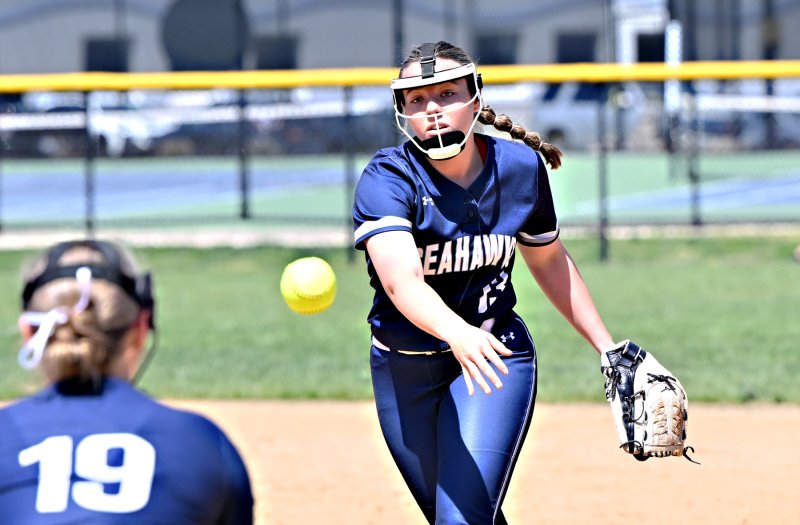 Sussex Academy junior second baseman Grayce Glover tosses to teammate Audrey Snyder for an out. DAN COOK PHOTOS
