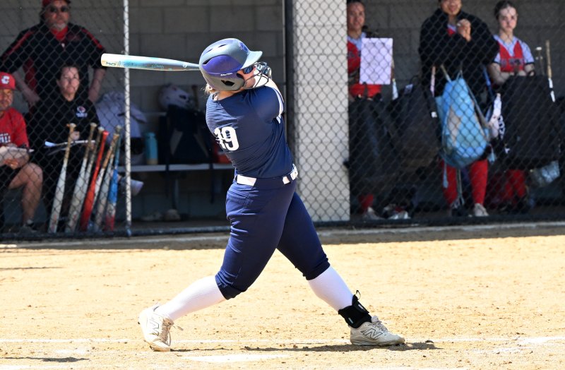 Freshman Audrey Snyder slams one into the outfield.