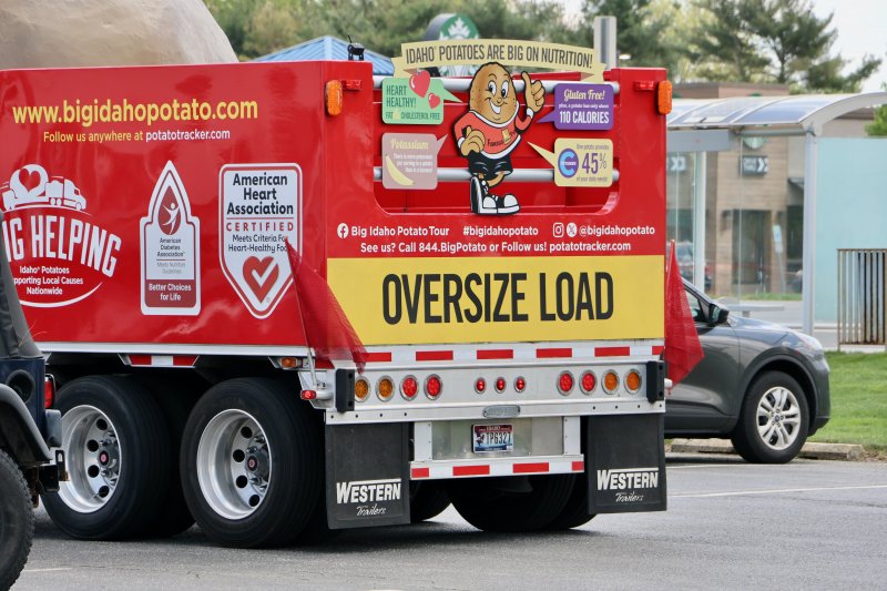 The big red truck, named Spuddy Buddy, is adorned with facts about Famous Idaho Potatoes.