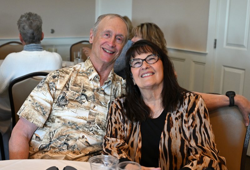 Dr. Kirk and Linda Beebe await the start of the music. Linda is the singer for the band 33 1/3.