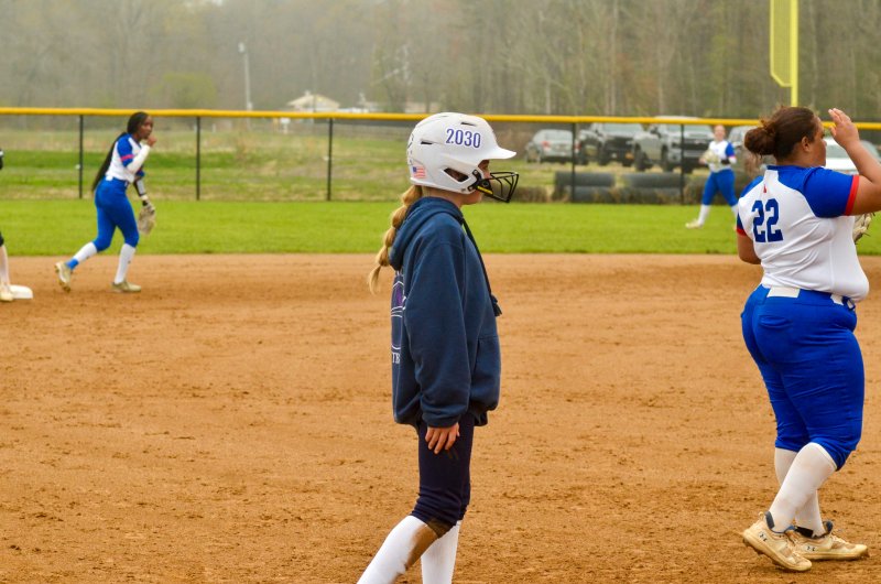 Sussex Academy Aubrey Campanese stands on third base.