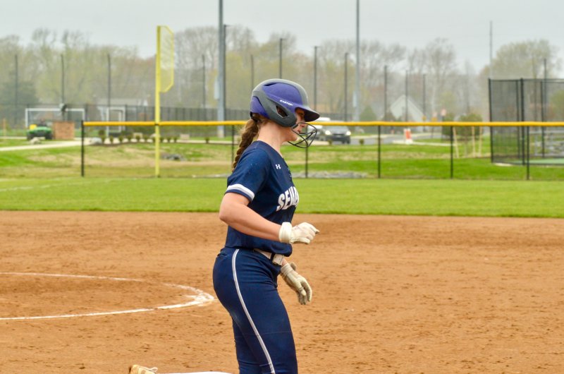 Seahawks junior Caroline White begins to round first base.