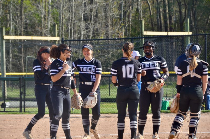 Sussex Tech players (l-r) Gabriella Gianacoplis, Journey Hearne, Kathryn Calloway, Paige Krepps, Cierra Lewis and Bella Brittingham enjoy an out celebration in the circle.