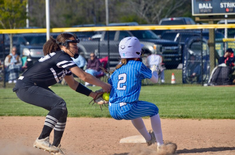 Sussex Tech junior Bella Brittingham made a perfect throw to freshman Journey Hearne to catch Cape freshman Emma Reynolds attempting to steal second base.