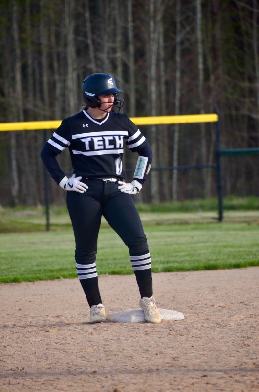 Ravens senior Adrianna Heck looks to home after planting her flag on second.