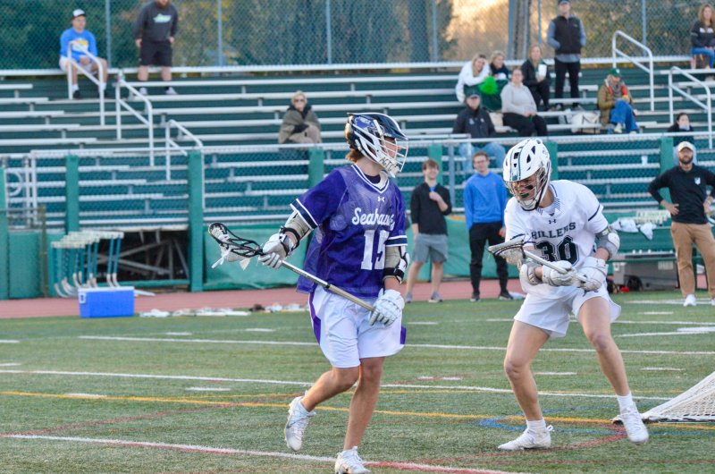 Sussex Academy sophomore Cooper Hagy operates behind the cage.