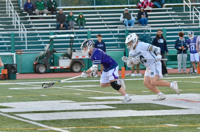 Sussex Academy junior Jack “Taco” Meszaros wins another face-off during the Seahawks’ 10-9 loss to Tower Hill April 10. AARON R. MUSHRUSH PHOTOS