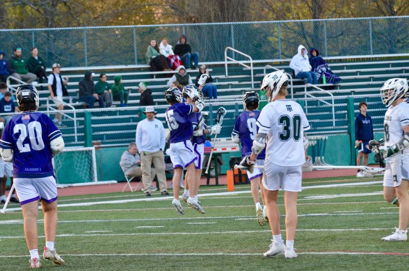 Seahawks sophomore Cooper Hagy leaps for joy after a goal.