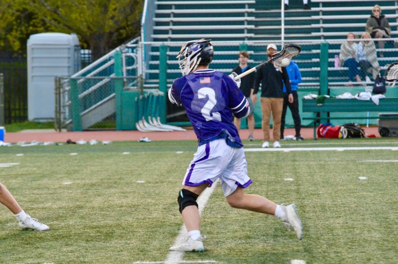 Sussex Academy junior Taco Meszaros begins to shoot on his buzzer-beater goal.