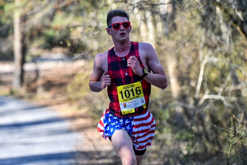 Austin Parry runs the half-marathon in 1:19:16, good for third place.