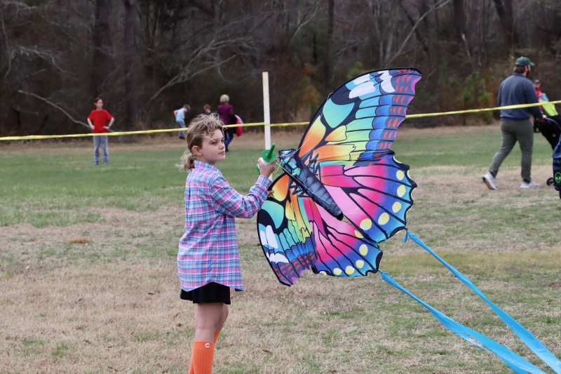 Nobalee Coleman, 8, from Bel Air, Md., is a fifth-generation kite flyer. Her father, Michael, said his great-grandmother started bringing the family to the festival decades ago. The day started off calm, but when the wind picked up, the sky was filled a variety of kites. The annual event is hosted by the Lewes Chamber of Commerce.