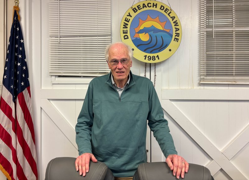 Dewey Beach Commissioner Gary Persinger is named the town’s 2026 Volunteer of the Year at a March 20 town council meeting. ELLEN MCINTYRE PHOTO