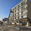 A fence has been installed on the Rehoboth Beach Boardwalk in advance of work being done to replace railings on some rooms at the Atlantic Sands Hotel. CHRIS FLOOD PHOTOS