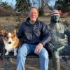 Perry Higgs with his dog Wilson at the John Milton statue. SUBMITTED PHOTO