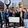 Cathy Tatman holds a large check with a $5,000 donation to the Lewes Junction Railroad and Bridge Association Jan. 23. The donation is the first to the Greater Lewes Foundation’s newly launched community campaign to “Bring #60 for 250.” No. 60 is LJRBA’s 1913 locomotive, which is due to arrive in Stango Park in late spring. Shown are (l-r) Andrea Brock, LJRBA; Gerry Kaplan, LJRBA; Robert Kennedy, LJRBA; Joe Stewart, Greater Lewes Foundation; Cathy Tatman, LJRBA; Randy Voith, LJRBA; Mike Rawl, Greater Lewes Foundation; and David Ludlow, LJRBA. BILL SHULL PHOTO