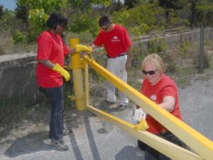Busy with their duties are (l-r) Dianne Richardson, Sam Vasquez and Dee Hake. BY STEVEN BILLUPS