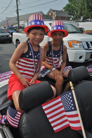 Alice and Kate Billings of Washington, D.C., are dressed up to celebrate the Fourth of July. BY RON MACARTHUR