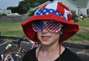 Carter Haegele, on vacation from Virginia, sports the cool Fourth of July look. BY RON MACARTHUR