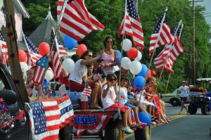 Get a flatbed, some people (with a lot of kids) and add some flags and you have a Doo-Dah Parade float. BY RON MACARTHUR