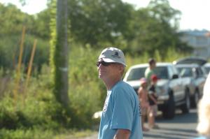The dean of Delaware distance running, Doug White, a 2011 Delaware Sports Hall of Fame inductee, rocks the crooked hat at the finish line of the Kelly Fritchman 5K. BY DAVE FREDERICK