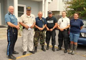 Members of Dewey Beach Police Department stayed in town throughout the storm. Shown are (l-r) Patrolman Tim Parkes, Chief Sam Mackert, Staff Sgt. Bob Berry, Cpl. Hal Barber, Patrolman Brandon Morris and Parking Enforcement Officer Kelsie Willey. BY DIANE HANSON