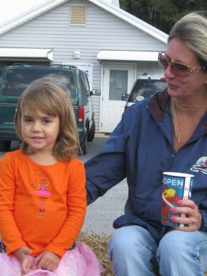 The hayride around East Coast Garden Center was a big draw for many families. Shown on the ride are (l-r) Maile Godwin, 2, and Kim Cordrey. BY RACHEL SWICK MAVITY